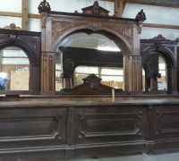 17D.....1 OF A KIND WALNUT CARVED BACK AND FRONT BAR 16' L X 11' H SEE 17E. 20B, 20C, 1279 TO 1286