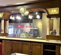 1M.....This beautiful bar has onyx columns and stained glass detail.  9