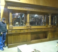 1388 -ANTIQUE CARVED BACK BAR - 15 FT LONG X 8 FT 2\'\' H (CAN RAISE HEIGHT)