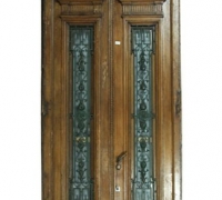 14E..A stately pair of walnut entry doors with iron inserts in the frame circa 1890. Doors: 123