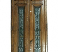 14C..A stately pair of walnut entry doors with iron inserts in the frame circa 1890. Doors: 123