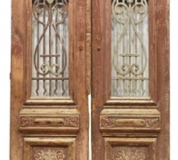 17A...CARVED WINGED ANGELS OVER IRON WINDOW INSERTS....109.5