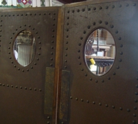 31-sold -antique-leather-and-brass-studded-doors