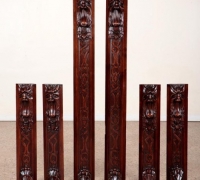 08f-six-carved-walnut-elements-with-faces-shorter-28-5-higher-52-25