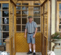 197- - sold - great-antique-iron-and-stained-glass-elevator-with-iron-accordion-door-circa-1910