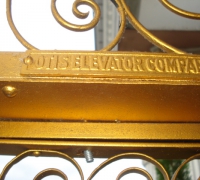 516-sold -great-antique-iron-and-stained-glass-elevator-with-iron-accordion-door-circa-1910