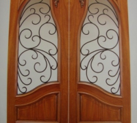 07-pair-of-new-carved-iron-and-wood-doors